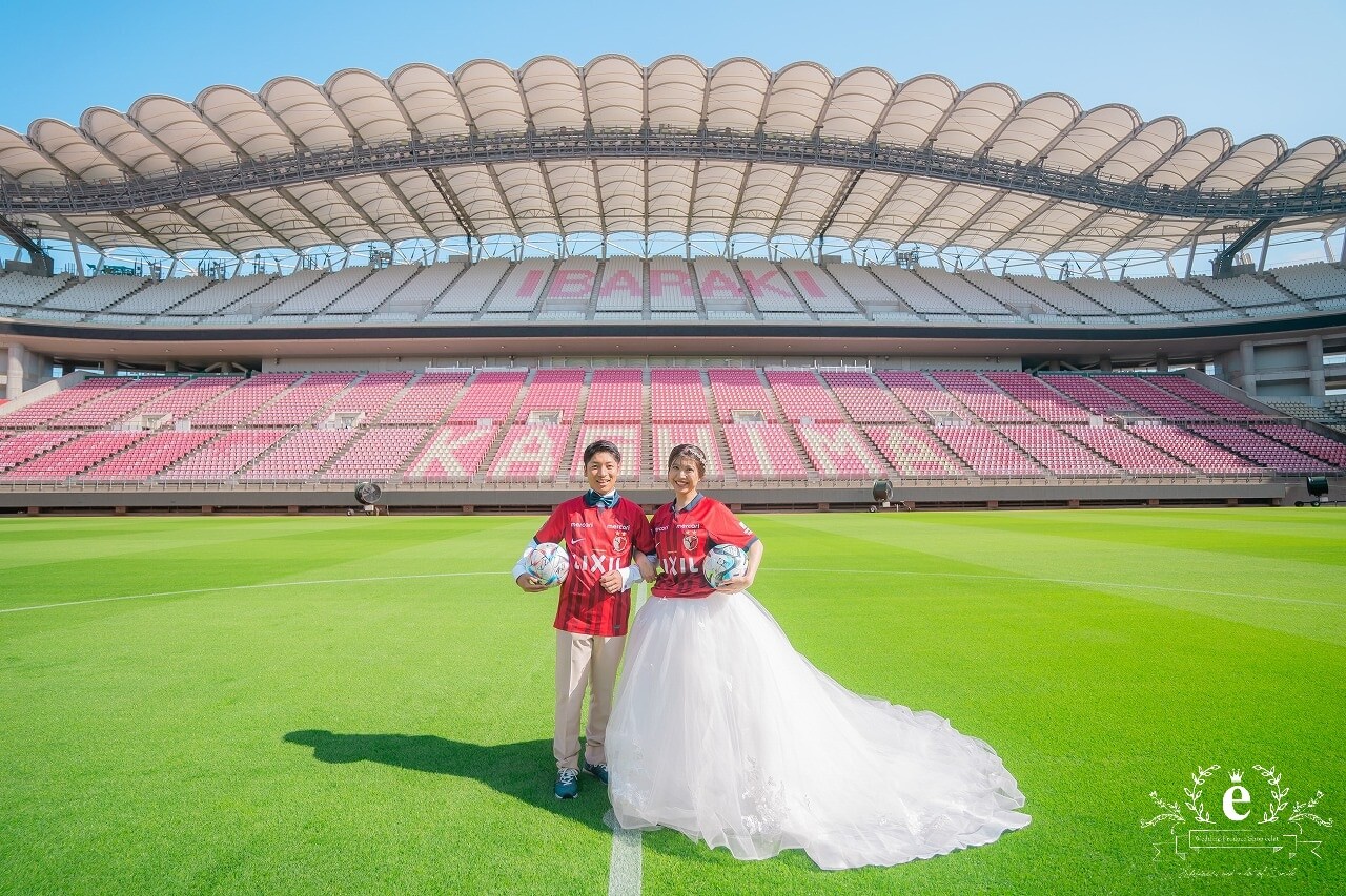 カシマサッカースタジアム 鹿島サッカースタジアム 挙式 結婚式 写真 ウェディング サッカー 趣味 アントラーズ ウェディングフォト ユニフォーム 水戸エクラ エクラ